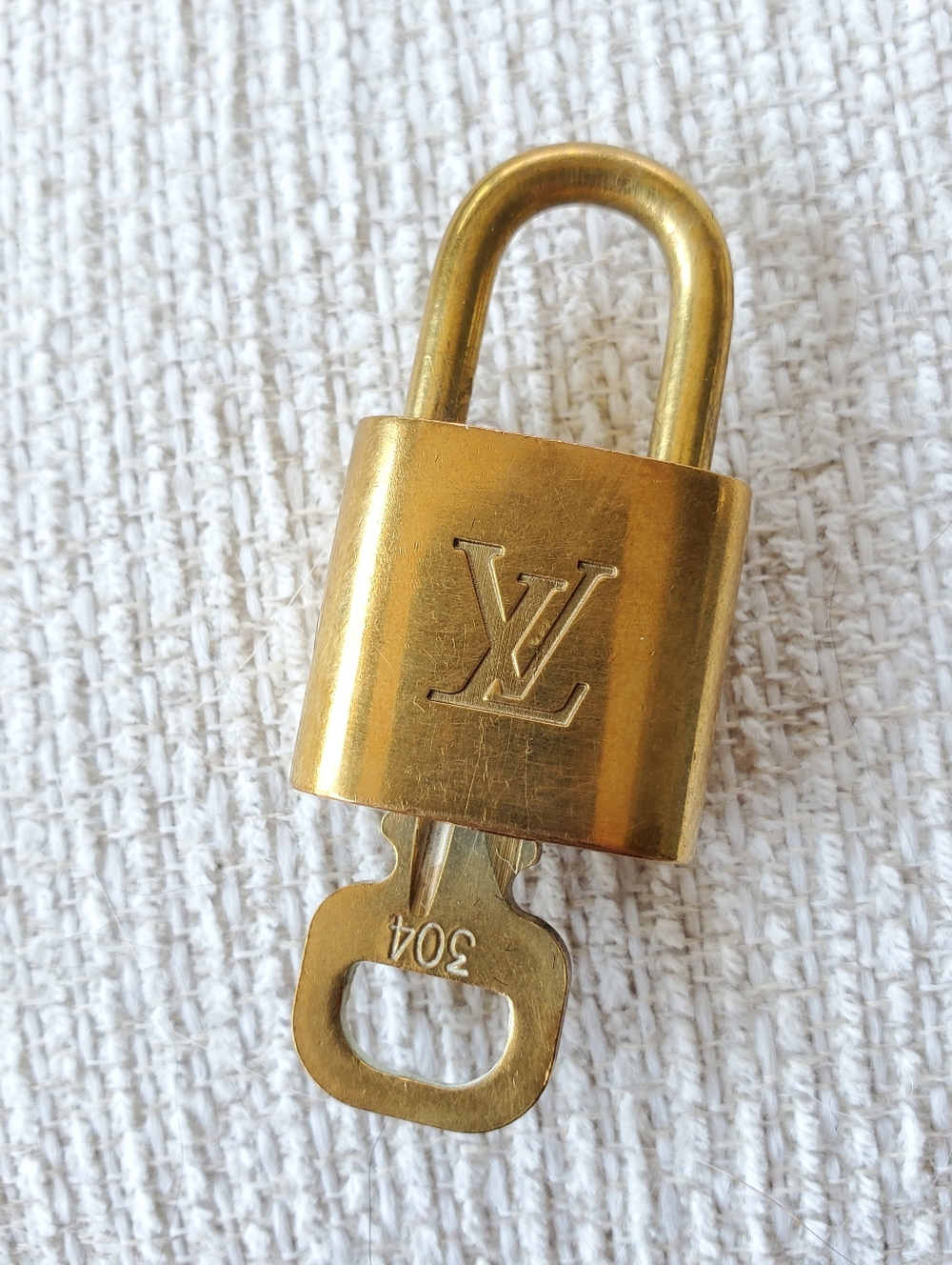 Louis Vuitton Gold Padlock with Key